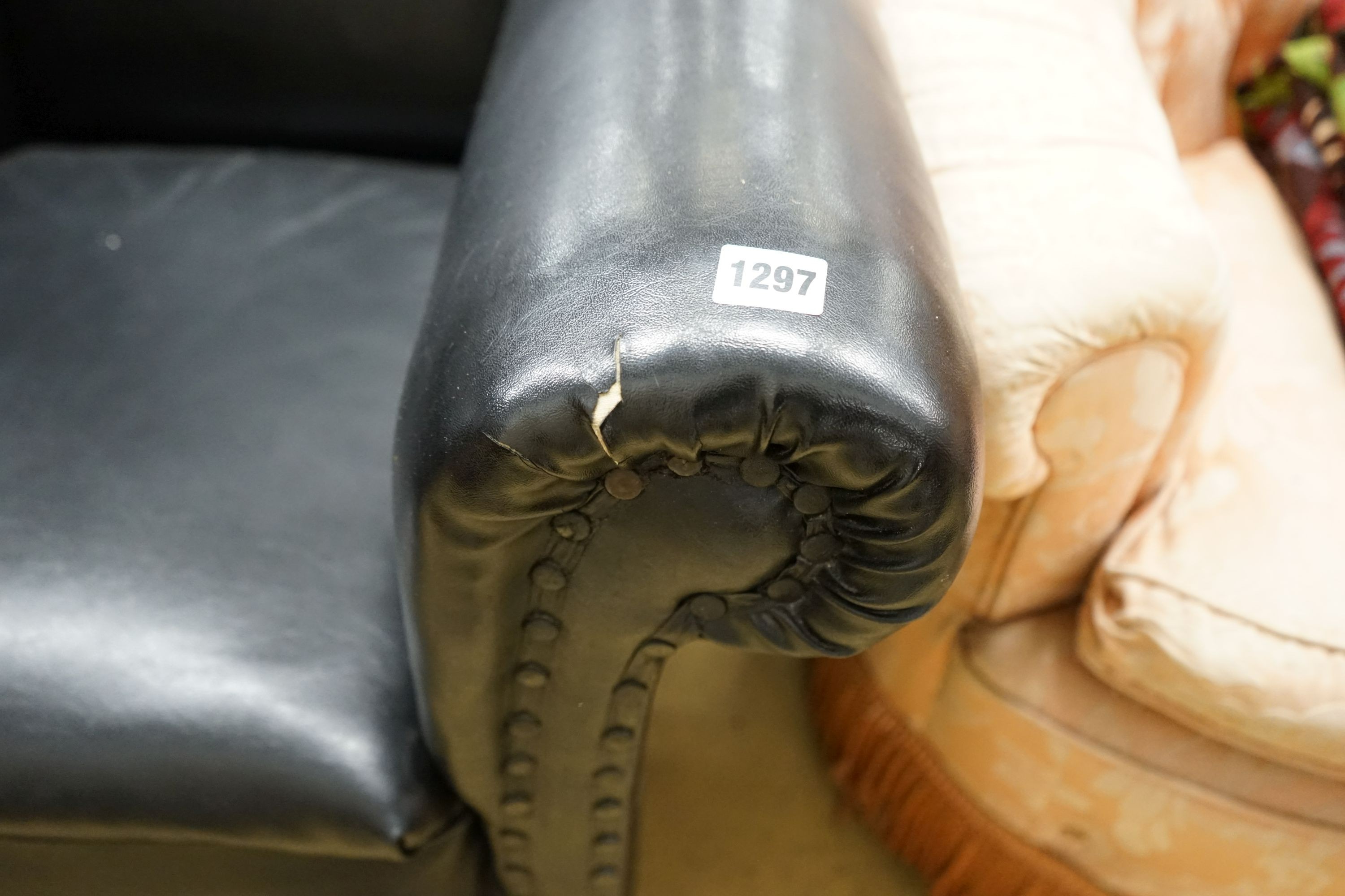 A pair of early 20th century club armchairs, width 88cm, depth 88cm, height 84cm